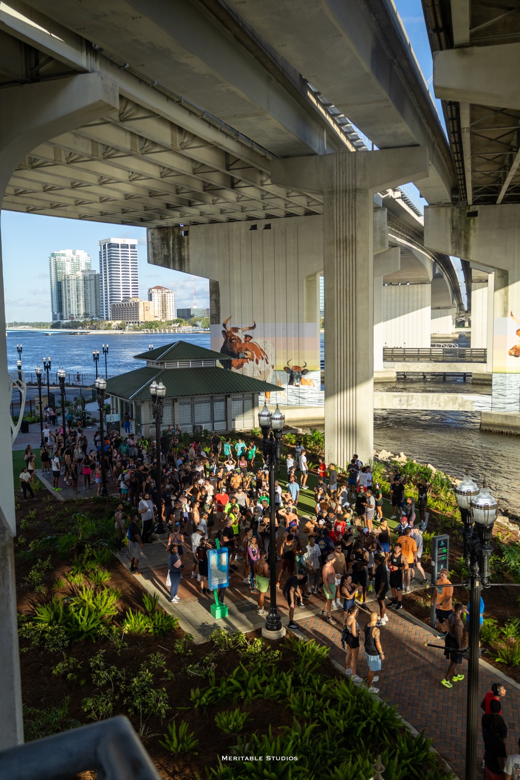 Jacksonville Run Club gathering beneath the Main Street Bridge